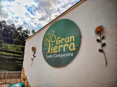 a sign on the side of a building at Gran Tierra - Sabaneta in Medellín
