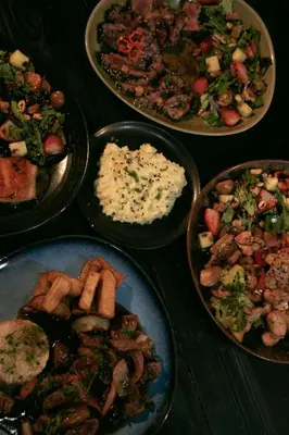 a group of plates of food on a table at Porto Marina Hotel in Guatapé