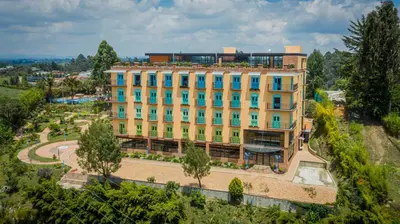 an overhead view of a large yellow building at Alfahar Hotel in Carmen de Viboral
