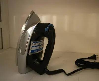 a telephone with a tag on it sitting on the floor at La Lunar un espacio ideal para trabajar y conocer Medellín in Medellín