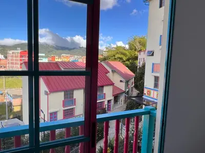 a view from a window of a city at Apto Nuevo, Tranquilo a 5 min Plaza Principal in Guatapé
