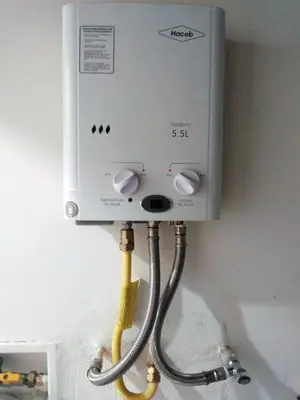 a water heater is attached to a wall at HABITACIÓN independiente con COCINA EN LAURELES ESTADIO para 3 personas in Medellín