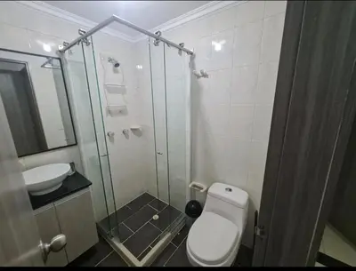 a bathroom with a shower and a toilet and a sink at Apartamento en envigado in Envigado