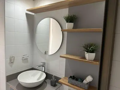 a bathroom with a white sink and a mirror at Nature and calm in El Poblado 505 in Medellín
