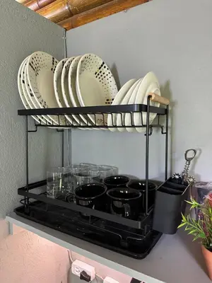 a shelf with plates and dishes on it at Loft bambu in Envigado