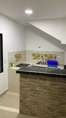 a kitchen with a sink and a counter top at APARTAMENTO EN DORADAL A 12 minutos de Nápoles in Doradal