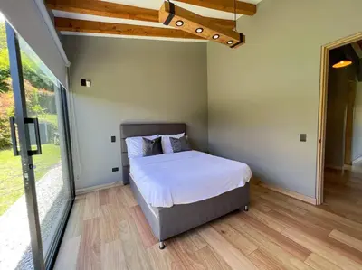a bedroom with a bed in a room at Amazing country house! in Rionegro