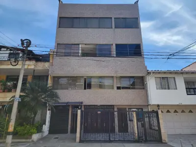 a building with a gate in front of it at Tu Refugio Acogedor en el corazón de Medellín Hab Privada A in Medellín